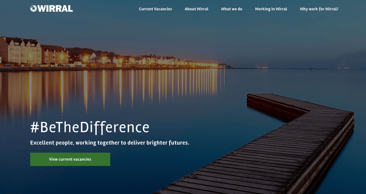 Wirral Council careers site header. Background image is a small pier overlooking a harbour at night. Text: #BeTheDifference: Excellent people, working together to deliver brighter futures.