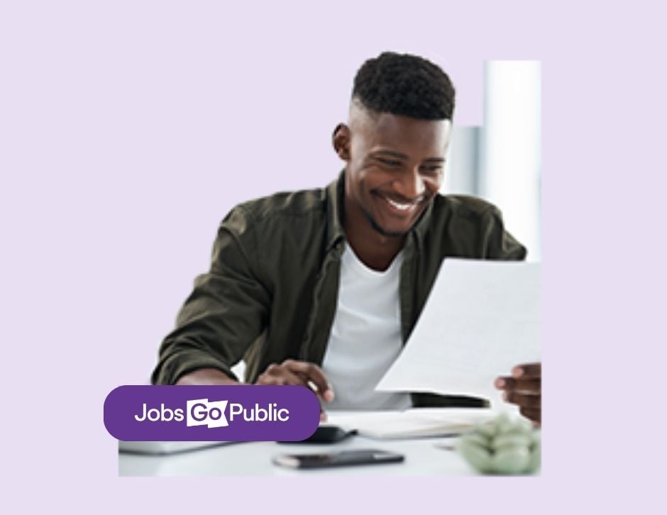 Lilac background with graphic of man looking at a CV in his hand
